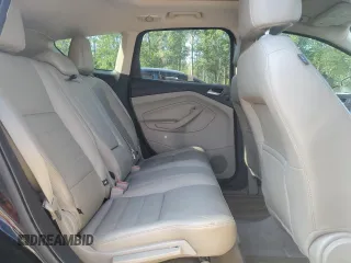 2013 Ford Escape SE z VIN 1FMCU0G95DUC27801, wystawiony jako Copart lot #63676255 z przebiegiem 175 587 mil mil oraz Czysty tytuł • Clean title. Historia ofert i sprzedaży dostępna na DreamBid. Obrazek 11.