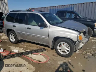 2005 GMC Envoy SLE z VIN 1GKDT13S552122428, wystawiony jako Copart lot #68651224 z przebiegiem 111 931 mil mil oraz Szkody całkowita. Historia ofert i sprzedaży dostępna na DreamBid. Obrazek 4.