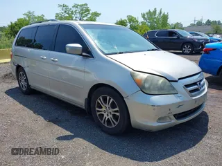 2005 Honda Odyssey Touring z VIN 5FNRL38805B025158, wystawiony jako IAAI lot #42418179 z przebiegiem 167 650 mil mil oraz . Historia ofert i sprzedaży dostępna na DreamBid. Obrazek 1.