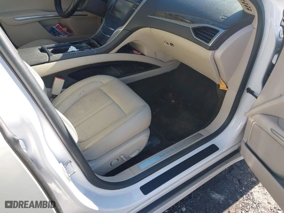2016 Lincoln MKZ with VIN 3LN6L2G97GR627074, listed as a IAAI auction lot 41257387 with 211,724 mi miles. Bid and sale history available at carsss.com. Image 5.