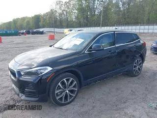 2022 BMW X2 sDrive28i z VIN WBXYH9C00N5U57853, wystawiony jako IAAI lot #41958326 z przebiegiem 49 518 mil mil oraz . Historia ofert i sprzedaży dostępna na DreamBid. Obrazek 17.
