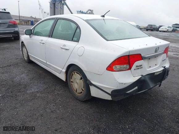 2010 Honda Civic Hybrid with VIN JHMFA3F23AS005117, listed as a IAAI auction lot 41956295 with 211,151 mi miles. Bid and sale history available at carsss.com. Image 3.