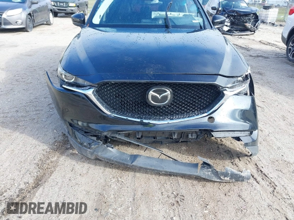 2019 Mazda CX-5 Touring with VIN JM3KFACM0K0692007, listed as a IAAI auction lot 41645657 with 1 mi miles. Bid and sale history available at carsss.com. Image 6.