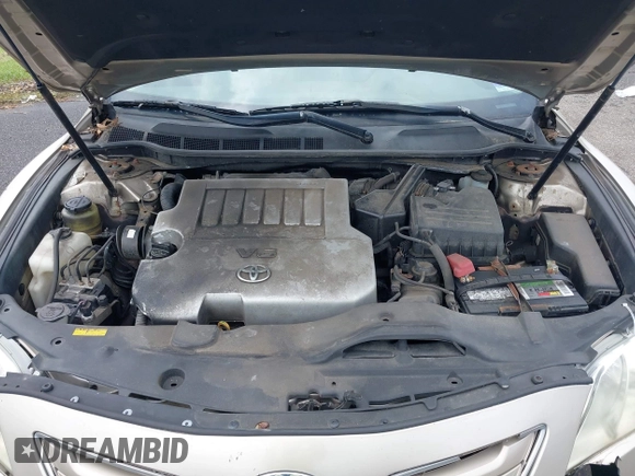2009 Toyota Camry LE z VIN 4T1BK46KX9U089242, wystawiony jako IAAI lot #42448998 z przebiegiem 252 787 mil mil oraz . Historia ofert i sprzedaży dostępna na DreamBid. Obrazek 10.