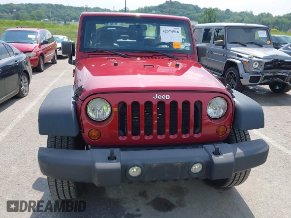 2013 Jeep Wrangler Sport z VIN 1C4GJWAG0DL543850, wystawiony jako IAAI lot #42374916 z przebiegiem 163 977 mil mil oraz . Historia ofert i sprzedaży dostępna na DreamBid. Obrazek 12.