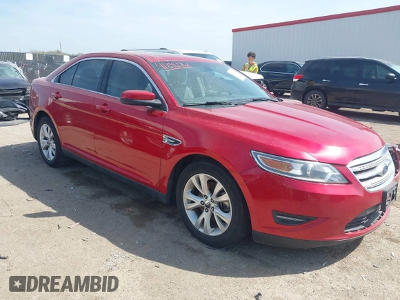 2011 Ford Taurus SEL z VIN 1FAHP2EW7BG123740, wystawiony jako IAAI lot #41890761 z przebiegiem 132 310 mil mil oraz . Historia ofert i sprzedaży dostępna na DreamBid. Obrazek 1.