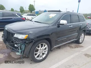 2015 Jeep Grand Cherokee Summit z VIN 1C4RJFJT0FC674494, wystawiony jako IAAI lot #42056835 z przebiegiem 143 969 mil mil oraz . Historia ofert i sprzedaży dostępna na DreamBid. Obrazek 19.