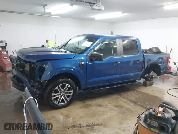 2023 Ford F-150 XL with VIN 1FTEW1EP8PKG08718, listed as a IAAI auction lot 41609293 with 26,414 mi miles. Bid and sale history available at carsss.com. Image 2.
