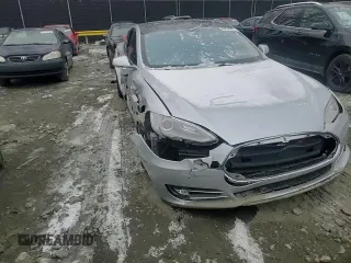 2013 Tesla Model S with VIN 5YJSA1AC9DFP10705, listed as a Copart auction lot 89394665 with Not Provided miles and Salvage Title. Bid and sale history available at carsss.com. Image 11.