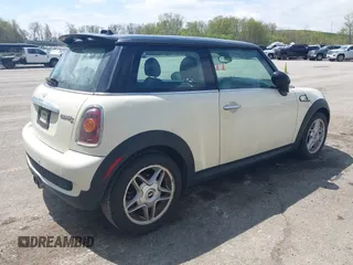 2007 MINI Hardtop S with VIN WMWMF73567TT84033, listed as a IAAI auction lot 42189573 with 75,177 mi miles and . Bid and sale history available at DreamBid. Image 4.