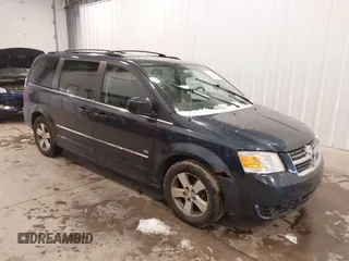 2009 Dodge Grand Caravan SXT z VIN 2D8HN54X89R645251, wystawiony jako IAAI lot #41916035 z przebiegiem 183 678 mil mil oraz . Historia ofert i sprzedaży dostępna na DreamBid. Obrazek 1.