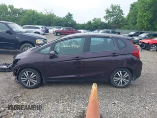 2015 Honda Fit EX z VIN 3HGGK5G80FM751625, wystawiony jako IAAI lot #42427480 z przebiegiem 109 657 mil mil oraz . Historia ofert i sprzedaży dostępna na DreamBid. Obrazek 15.