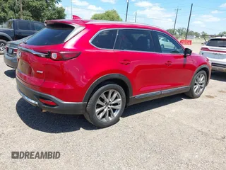 2017 Mazda CX-9 Grand Touring z VIN JM3TCADY3H0140895, wystawiony jako IAAI lot #42817948 z przebiegiem 125 288 mil mil oraz . Historia ofert i sprzedaży dostępna na DreamBid. Obrazek 4.