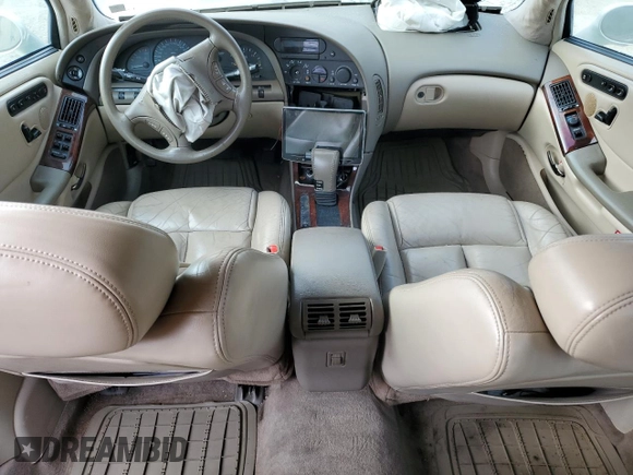 1999 Oldsmobile Aurora with VIN 1G3GR62C4X4112642, listed as a Copart auction lot 48176035 with 100,342 mi miles and Salvage Title. Bid and sale history available at DreamBid. Image 8.