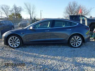 2020 Tesla Model 3 Long Range with VIN 5YJ3E1EB9LF795408, listed as a IAAI auction lot 41735428 with 56,013 mi miles. Bid and sale history available at carsss.com. Image 14.
