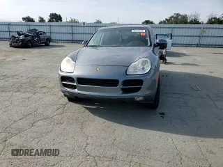 2005 Porsche Cayenne z VIN WP1AA29P65LA23655, wystawiony jako Copart lot #55174175 z przebiegiem 153 837 mil mil oraz Szkoda całkowita • Salvage title. Historia ofert i sprzedaży dostępna na DreamBid. Obrazek 13.