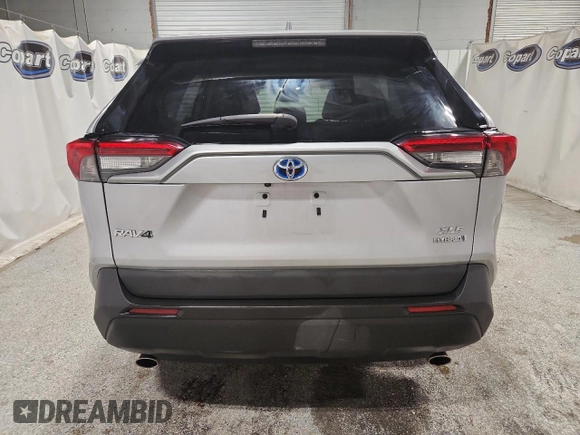 2022 Toyota RAV4 Hybrid XLE Premium with VIN 4T3B6RFV1NU080099, listed as a Copart auction lot 60206905 with 59,859 mi miles and Clean title. Bid and sale history available at DreamBid. Image 6.