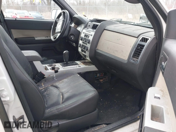 2009 Mercury Mariner Premier with VIN 4M2CU97G19KJ01231, listed as a IAAI auction lot 41674517 with Not Provided miles and . Bid and sale history available at DreamBid. Image 5.