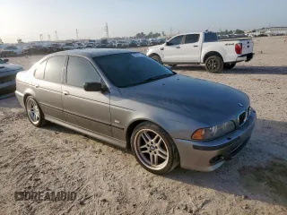 2003 BMW 5 Series 540i z VIN WBADN63473GN88833, wystawiony jako Copart lot #61287275 z przebiegiem 133 101 mil mil oraz Czysty tytuł • Clean title. Historia ofert i sprzedaży dostępna na DreamBid. Obrazek 4.