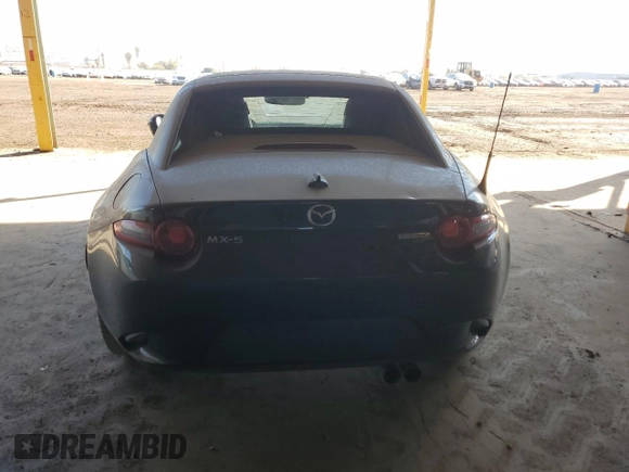 2023 Mazda MX-5 Miata Grand Touring z VIN JM1NDAM71P0551782, wystawiony jako Copart lot #88795725 z przebiegiem 22 626 mil mil oraz Nie do naprawy • Non repairable. Historia ofert i sprzedaży dostępna na DreamBid. Obrazek 6.