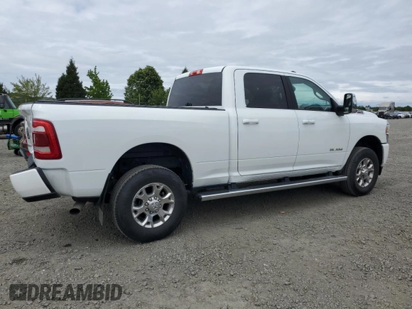 2023 Ram 2500 Laramie with VIN 3C6UR5FJ1PG634158, listed as a Copart auction lot 57164505 with 18,279 mi miles and Salvage title. Bid and sale history available at DreamBid. Image 3.