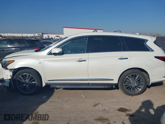 2017 Infiniti QX60 with VIN 5N1DL0MM2HC550358, listed as a IAAI auction lot 41664787 with 133,024 mi miles and . Bid and sale history available at DreamBid. Image 14.
