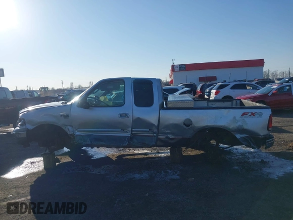2003 Ford F-150 XL z VIN 1FTRX18W53NA29776, wystawiony jako IAAI lot #41413445 z przebiegiem 231 533 mil mil oraz . Historia ofert i sprzedaży dostępna na DreamBid. Obrazek 14.