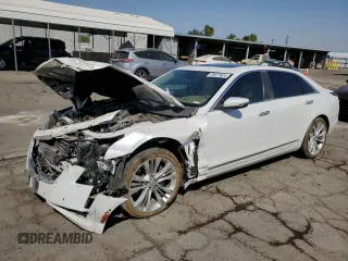 2017 Cadillac CT6 Platinum AWD z VIN 1G6KN5R60HU124243, wystawiony jako Copart lot #69525924 z przebiegiem 95 601 mil mil oraz Szkoda całkowita • Salvage title. Historia ofert i sprzedaży dostępna na DreamBid. Obrazek 1.
