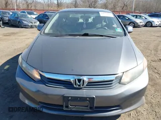 2012 Honda Civic LX z VIN 19XFB2F52CE329264, wystawiony jako IAAI lot #41654894 z przebiegiem 110 836 mil mil oraz . Historia ofert i sprzedaży dostępna na DreamBid. Obrazek 12.