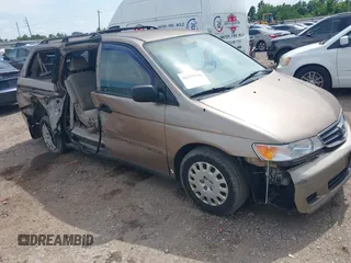 2003 Honda Odyssey LX z VIN 5FNRL18553B115655, wystawiony jako IAAI lot #42359736 z przebiegiem 102 238 mil mil oraz . Historia ofert i sprzedaży dostępna na DreamBid. Obrazek 1.