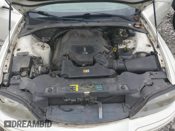 2005 Lincoln LS Sport z VIN 1LNHM87A05Y667868, wystawiony jako Copart lot #73318074 z przebiegiem 114 623 mil mil oraz Szkoda całkowita • Salvage title. Historia ofert i sprzedaży dostępna na DreamBid. Obrazek 12.