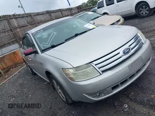 2008 Ford Taurus SEL with VIN 1FAHP24W48G125035, listed as a IAAI auction lot 42149505 with 201,502 mi miles. Bid and sale history available at carsss.com. Image 1.