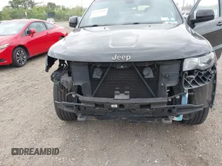 2016 Jeep Grand Cherokee Laredo z VIN 1C4RJFAG6GC475857, wystawiony jako IAAI lot #42311448 z przebiegiem 106 472 mil mil oraz . Historia ofert i sprzedaży dostępna na DreamBid. Obrazek 6.