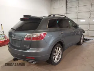 2012 Mazda CX-9 Grand Touring with VIN JM3TB3DV6C0360304, listed as a IAAI auction lot 41509627 with 163,986 mi miles. Bid and sale history available at carsss.com. Image 4.