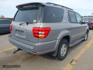 2001 Toyota Sequoia Limited with VIN 5TDBT48AX1S001532, listed as a IAAI auction lot 41543630 with 212,640 mi miles. Bid and sale history available at carsss.com. Image 4.