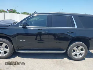 2020 Chevrolet Tahoe LS with VIN 1GNSCAKCXLR293278, listed as a IAAI auction lot 41973191 with 61,907 mi miles and . Bid and sale history available at DreamBid. Image 14.
