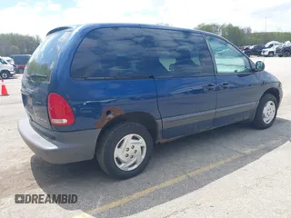 2000 Dodge Caravan SE with VIN 2B4GP45G3YR703761, listed as a IAAI auction lot 42106115 with 121,870 mi miles and . Bid and sale history available at carsss.com. Image 4.