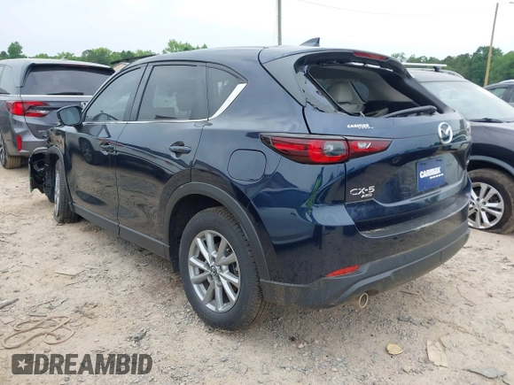 2023 Mazda CX-5 S Carbon Edition z VIN JM3KFBCM6P0251947, wystawiony jako IAAI lot #42286595 z przebiegiem 9 434 mil mil oraz . Historia ofert i sprzedaży dostępna na DreamBid. Obrazek 3.