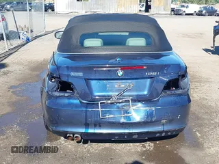 2010 BMW 1 Series 128i with VIN WBAUN1C59AVH81847, listed as a IAAI auction lot 40496951 with 148,463 mi miles and . Bid and sale history available at DreamBid. Image 17.