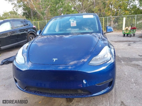 2024 Tesla Model Y with VIN 7SAYGDED5RF015208, listed as a IAAI auction lot 41608087 with NaN miles. Bid and sale history available at carsss.com. Image 12.