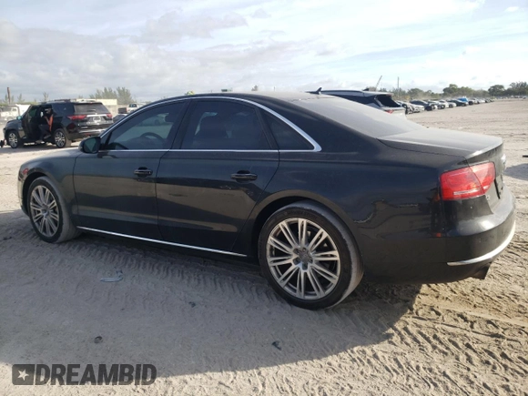 2013 Audi A8 3.0L with VIN WAUAGAFDXDN032766, listed as a Copart auction lot 84275944 with 127,388 mi miles and Salvage title. Bid and sale history available at DreamBid. Image 2.