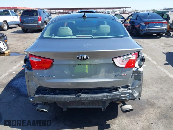 2014 Kia Optima EX z VIN 5XXGN4A72EG339786, wystawiony jako IAAI lot #42328516 z przebiegiem 103 035 mil mil oraz . Historia ofert i sprzedaży dostępna na DreamBid. Obrazek 6.