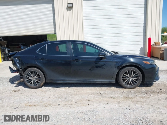2022 Toyota Camry SE z VIN 4T1G11AK0NU657071, wystawiony jako IAAI lot #41991413 z przebiegiem 86 272 mil mil oraz . Historia ofert i sprzedaży dostępna na DreamBid. Obrazek 13.