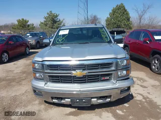 2015 Chevrolet Silverado 1500 LT with VIN 3GCUKREC0FG316716, listed as a IAAI auction lot 41908921 with 242,093 mi miles. Bid and sale history available at carsss.com. Image 12.