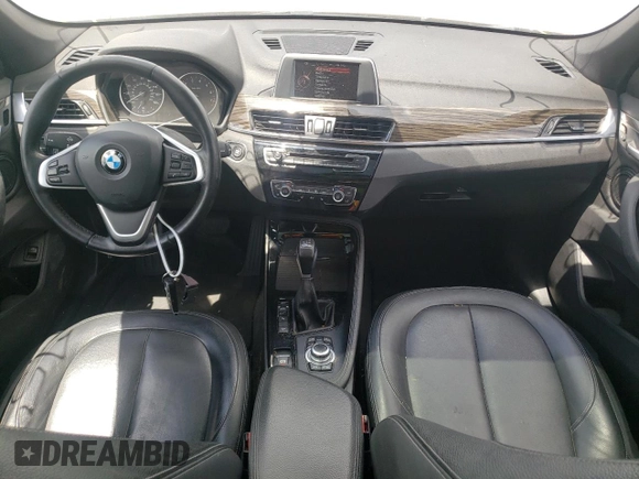 2016 BMW X1 xDrive28i with VIN WBXHT3C31GP880132, listed as a Copart auction lot 69129132 with 74,759 mi miles. Bid and sale history available at carsss.com. Image 9.