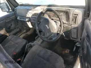 2004 Jeep Wrangler Sport Right Hand Drive with VIN 1J4F449S54P775671, listed as a Copart auction lot 85610114 with 199,074 mi miles and Salvage Title. Bid and sale history available at carsss.com. Image 8.
