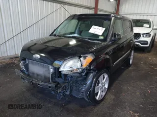 2010 Kia Soul + with VIN KNDJT2A21A7095510, listed as a IAAI auction lot 41879972 with 212,538 mi miles. Bid and sale history available at carsss.com. Image 2.