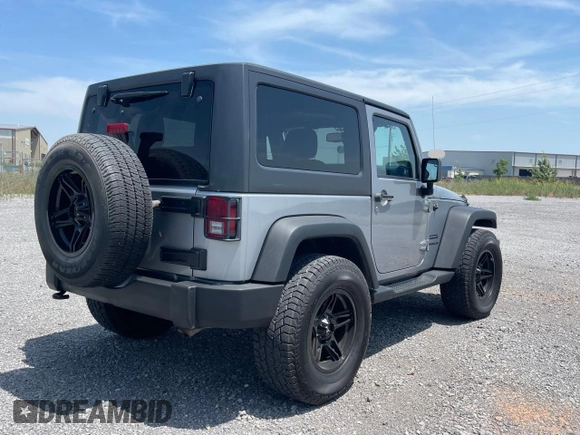 2014 Jeep Wrangler Sport with VIN 1C4AJWAG8EL147947, listed as a Copart auction lot 65750955 with 122,841 mi miles and Clean title. Bid and sale history available at DreamBid. Image 4.