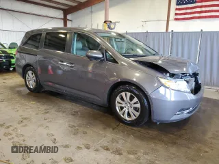 2014 Honda Odyssey EX-L with VIN 5FNRL5H6XEB134849, listed as a Copart auction lot 63617435 with 127,491 mi miles and Salvage title. Bid and sale history available at DreamBid. Image 4.