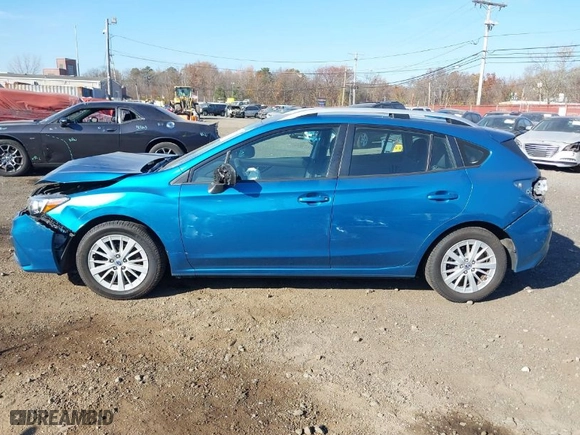 2017 Subaru Impreza Premium with VIN 4S3GTAD60H3712240, listed as a IAAI auction lot 40773945 with 133,146 mi miles. Bid and sale history available at carsss.com. Image 14.